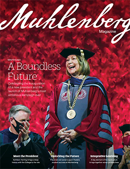 A magazine cover that says Muhlenberg Magazine with a college president in academic regalia pictured