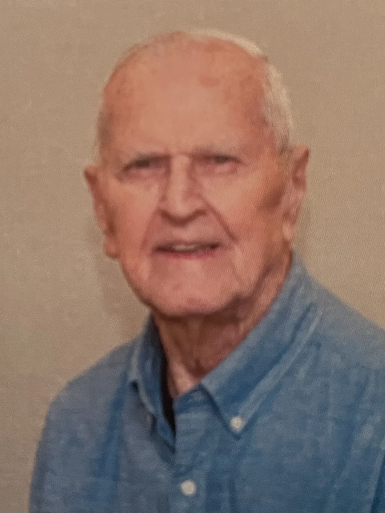 A picture of a man who graduated college in 1952