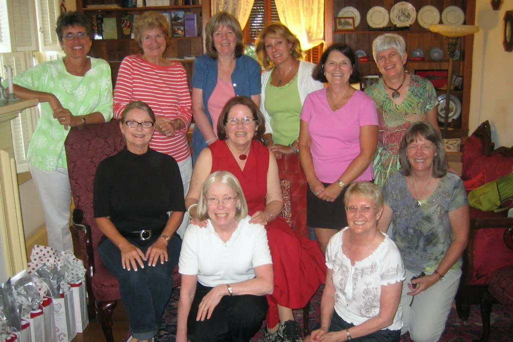A group of women in a living room looking space